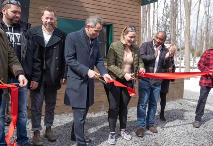 The new Vanier Sugar Shack officially re-opened March 28 at a cremony with, from left to right, Jonathan Paquette (President of the Board of Directors of the Vanier Museopark), Martin Sénécal and François Dion (Maylan Construction), Mayor Mark Sutcliffe and city councilors Stéphanie Plante and Rawlson King, and Madeleine Meilleur (Executive Director, Vanier Museopark) Photo: Doug Banks