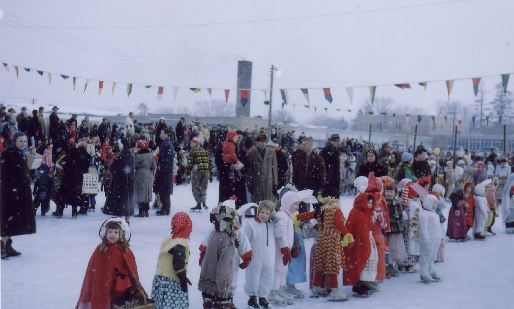 Times change, people don't. This undated photo show a crowd gathered for a skating party during a chilly day in the 1960s outside Manor Park Public Schoo. Currently, Manor Park Community Council is getting ready to prepare the rinks for a new skating season. Photo archives