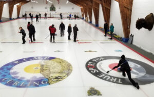 Club members sliding, sweeping and ‘hurrying hard’ during a friendly game at the R.C.M.P. Curling Club. PHOTO: COURTESY, MICHAEL BERNARDS
