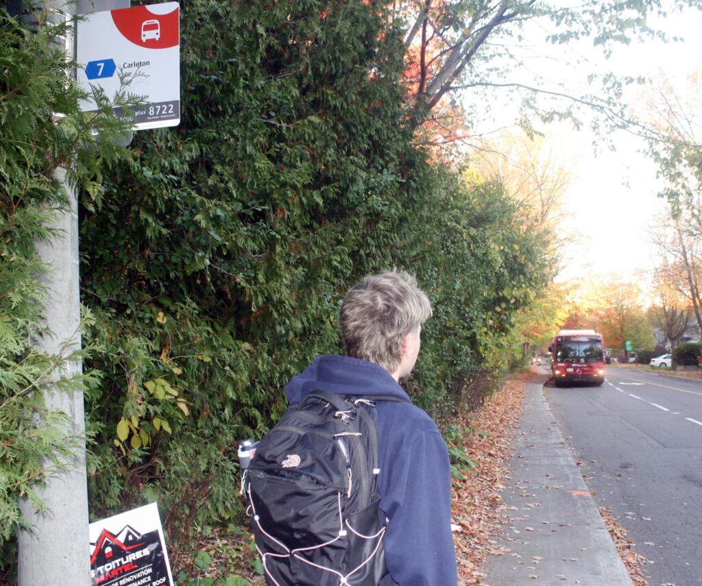 Manor Park resident Marleau Brown prepares to board the 7 (Carleton) bus at a stop off Hemlock Road. PHOTO: RYLAND COYNE