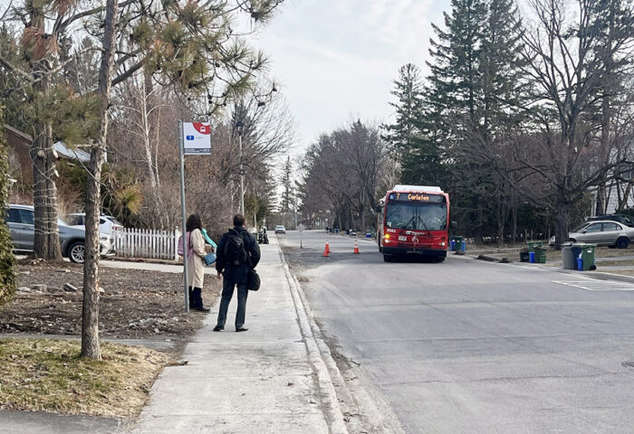 An OC Transpo bus navigates around the patched area on Birch Avenue to pick up passengers near Farnham Crescent. This section was repaired and paved on Tuesday, May 5. PHOTO: RYLAND COYNE